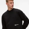 Avslappet sweatshirt med Karl-sitat