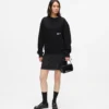 Avslappet sweatshirt med Karl-sitat