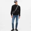 Avslappet sweatshirt med Karl-sitat