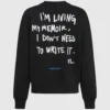 Avslappet sweatshirt med Karl-sitat