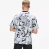 Avslappet T-skjorte med monogram over hele