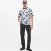 Avslappet T-skjorte med monogram over hele