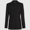 Blazer med belte og kontrastrevers