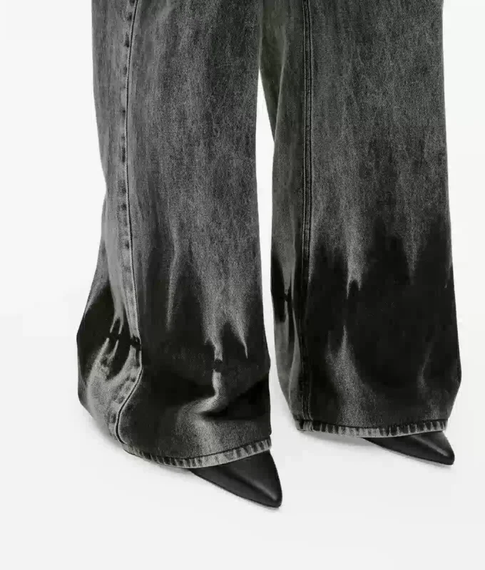 Bleket lavt sittende jeans med vid ben