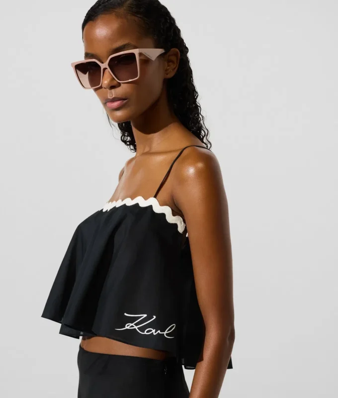 Cropped strandtop med bølgekant