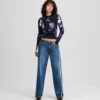 FRINGED MID-RISE RELAXED JEANS