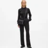 Ikon K crossbody-veske med nitter