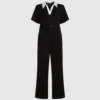 Jumpsuit med signaturkrage