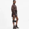 K/Signature crossbody-veske med nitter
