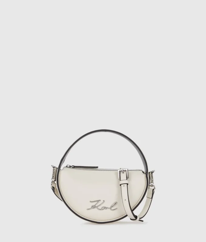K/Signature rund crossbody-veske