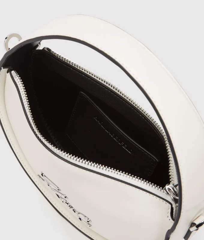 K/Signature rund crossbody-veske