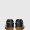 Kandidate skinnsneakers