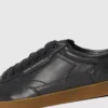 Kandidate skinnsneakers