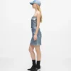 Mini-skjørt i belagt denim