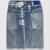 Mini-skjørt i belagt denim
