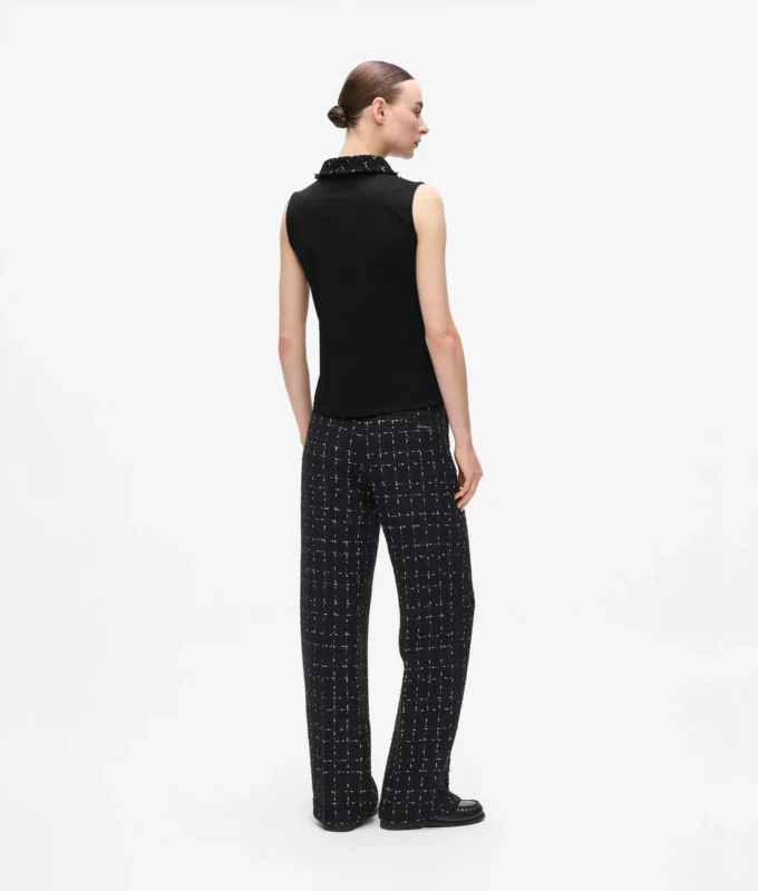 Polo med bouclé-detaljer