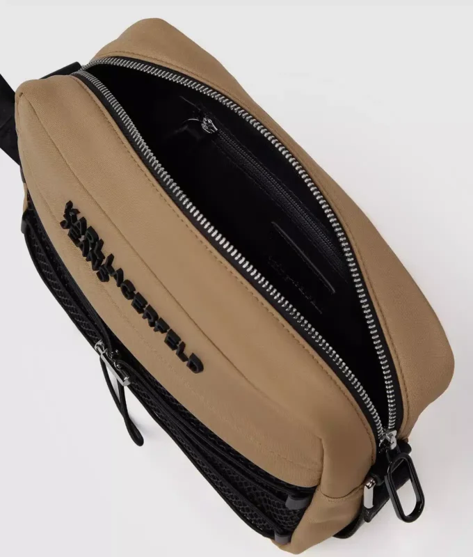 Praktisk crossbody-veske med snøring