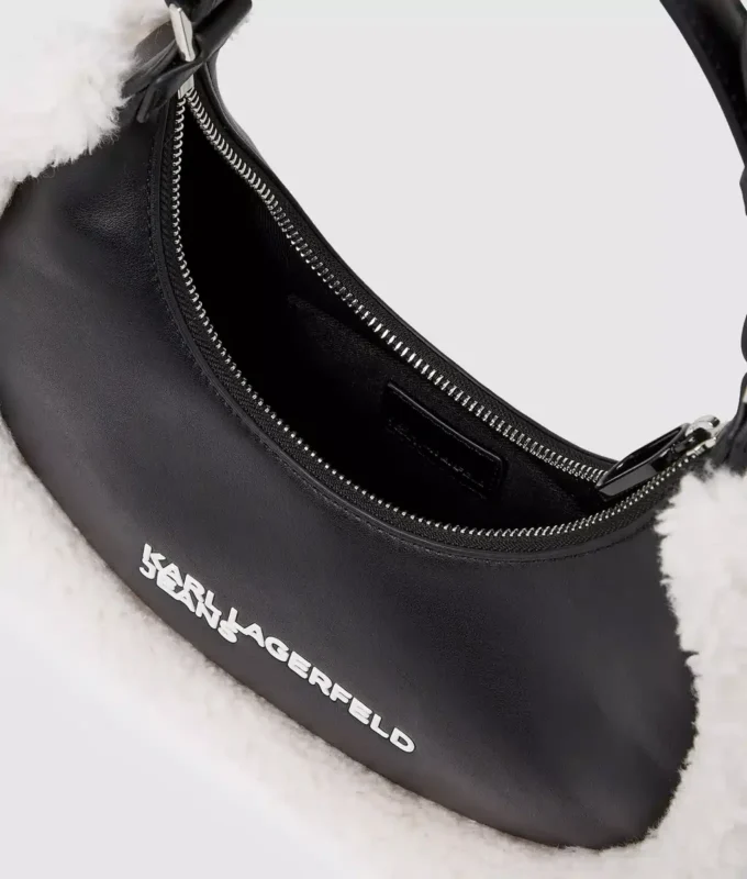 Skulderveske i shearling med månemotiv