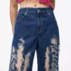 Slitte jeans med middels høy midje