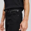 TAPERED JEANS MED GLIDELÅS