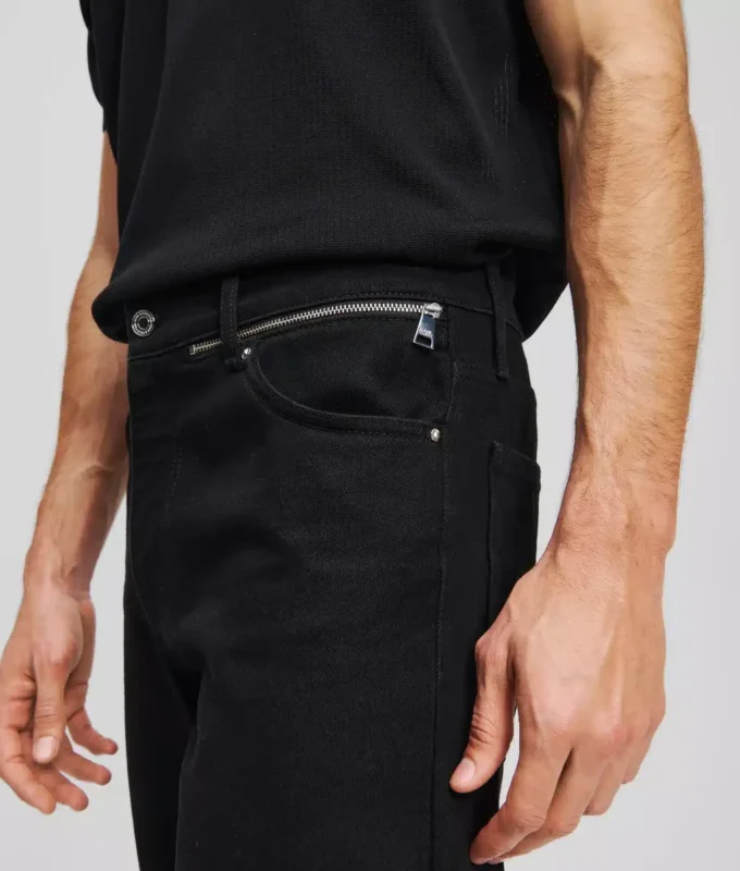 TAPERED JEANS MED GLIDELÅS