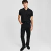 TAPERED JEANS MED GLIDELÅS