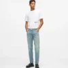 Tapered jeans med malingssprut