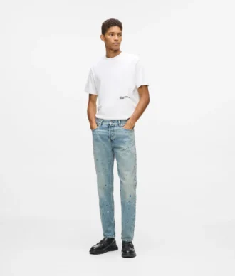 Tapered jeans med malingssprut
