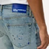 Tapered jeans med malingssprut