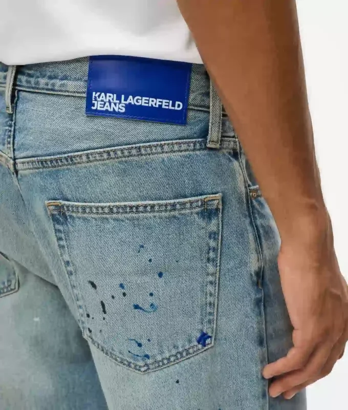Tapered jeans med malingssprut