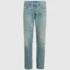 Tapered jeans med malingssprut