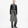 Tweed- og imitert skinnfrakk