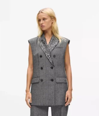 Tweedvest med paljettrevers