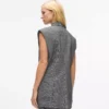 Tweedvest med paljettrevers