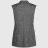 Tweedvest med paljettrevers