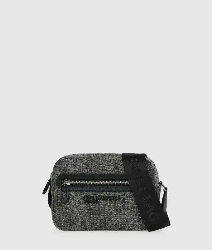 Vaskede denim crossbody-veske